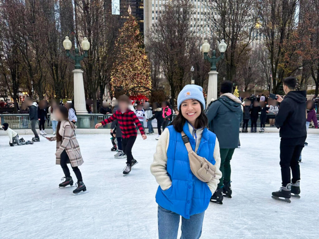 The author Lea Rose Allbaugh, ice skating with the crowd in Millennium Park