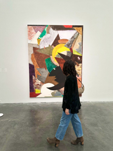 Travel Lemming Editor, Lea Rose Allbaugh, admiring the colorful artwork at the Museum of Contemporary Art