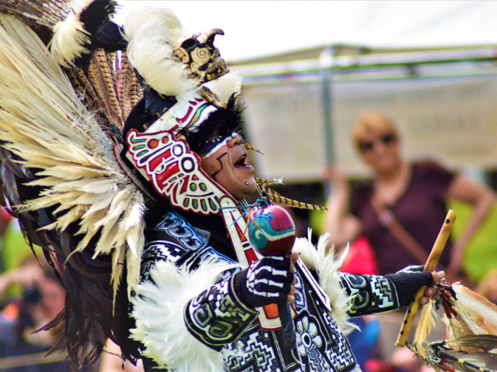 A man wearing the traditional costume of Lenape