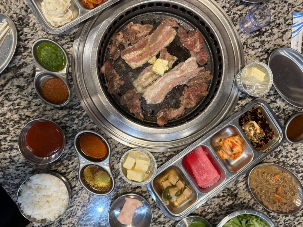 View of meat and side dishes in Let’s Meat KBBQ