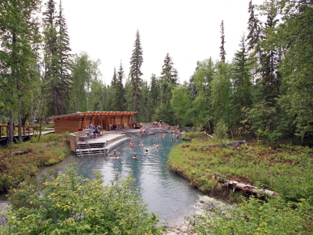 Liard Hot Springs along the Alaska Highway, surrounded by lush greenery