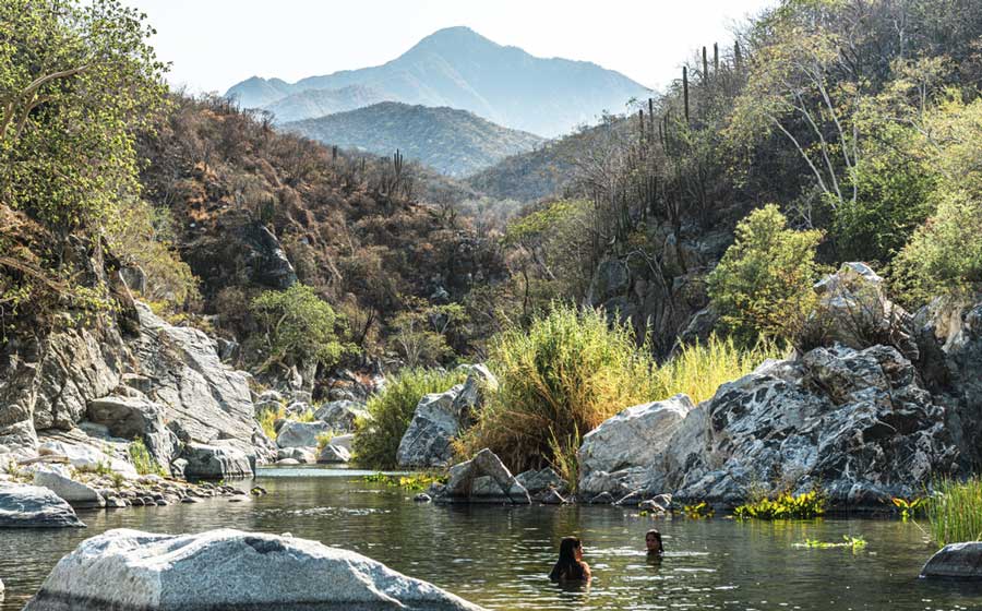 People enjoying their day in Lightfeather Hot Springs