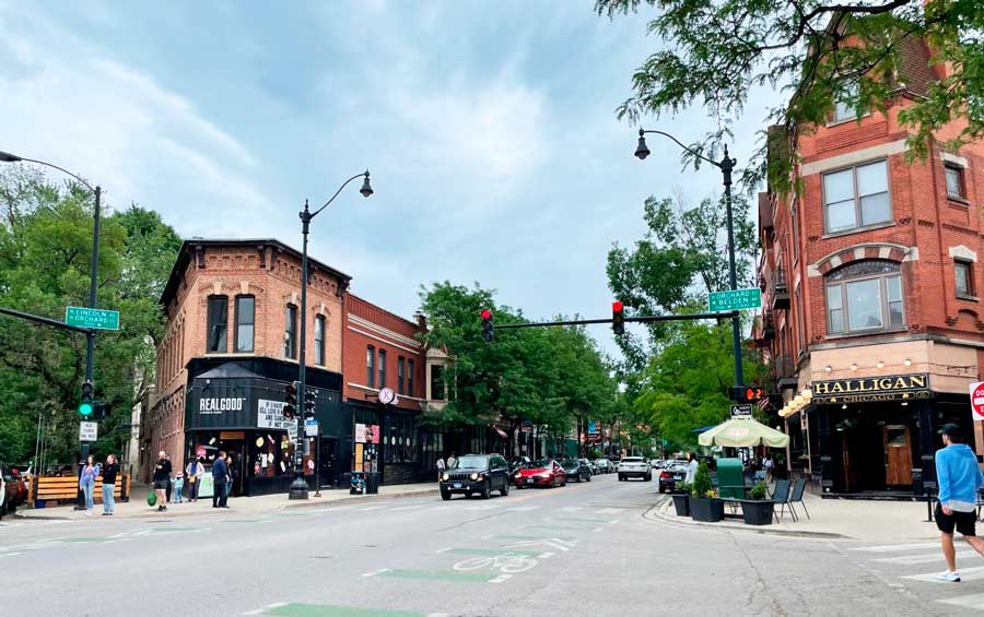 View of people and buildings in the neighborhood of Lincoln Park