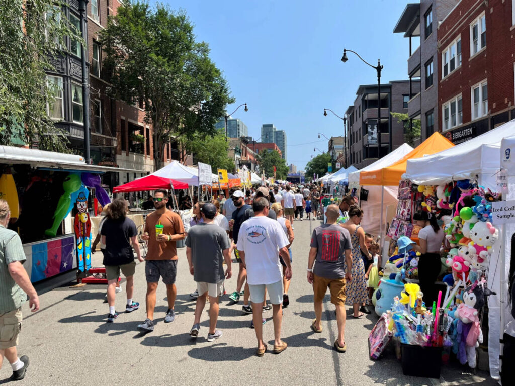 People Stroll and Browse Local Vendors at Lincoln Park Fest Street Fair