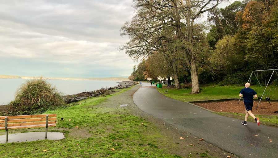 A man having a jog at Lincoln Park in Seattle