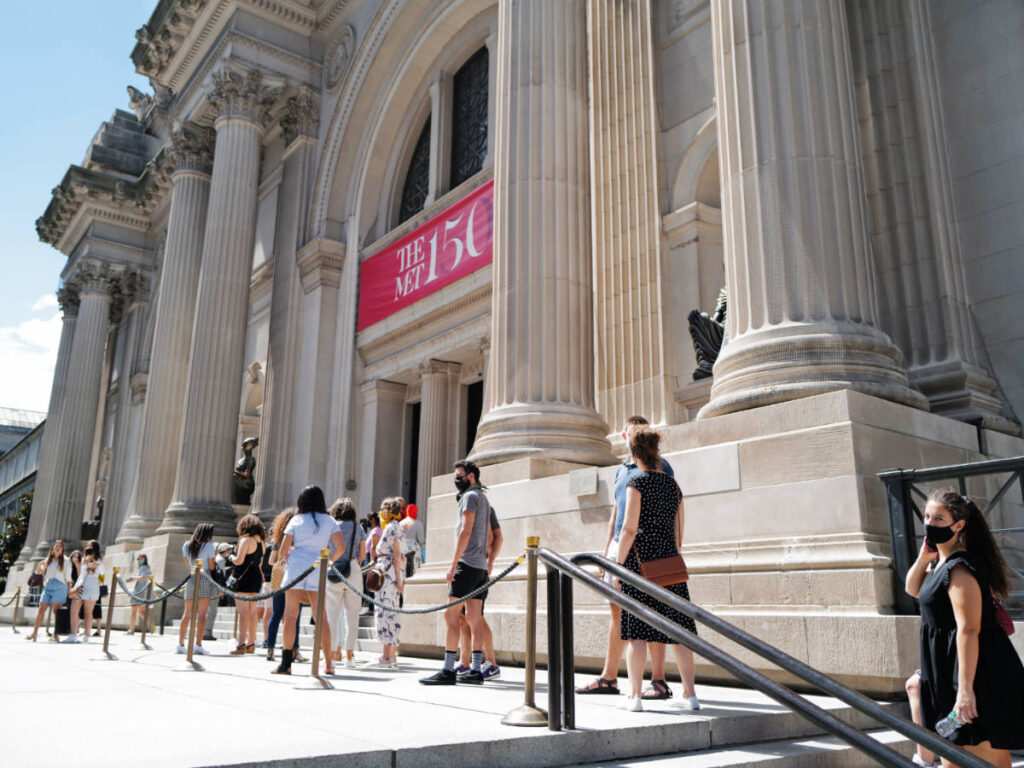 A line of people outside the Metropolitan Museum of Art