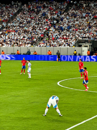 Lionel Messi warming up on the soccer field of MetLife Stadium