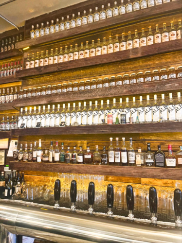 View of the liquor collection at the bar area of Jacob’s Pickles