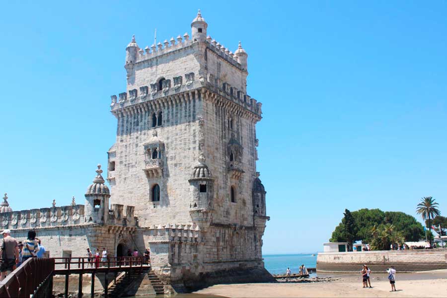 People visiting the Belem Tower in Lisbon