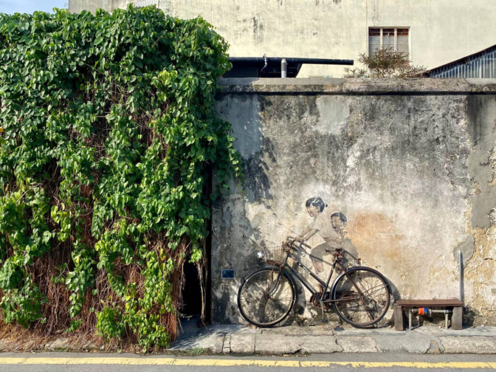 View of the amous “Little Children on a Bicycle” mural in Old Town Georgetown