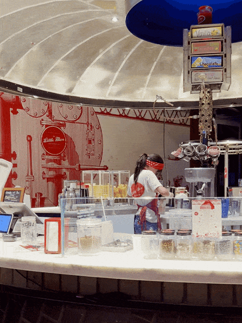A crew preparing the ice cream inside the Little Man Ice Cream Factory