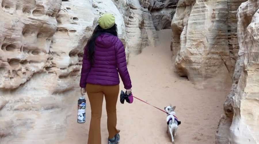 The author with her dog during their hike in Little Wild Horse Canyon
