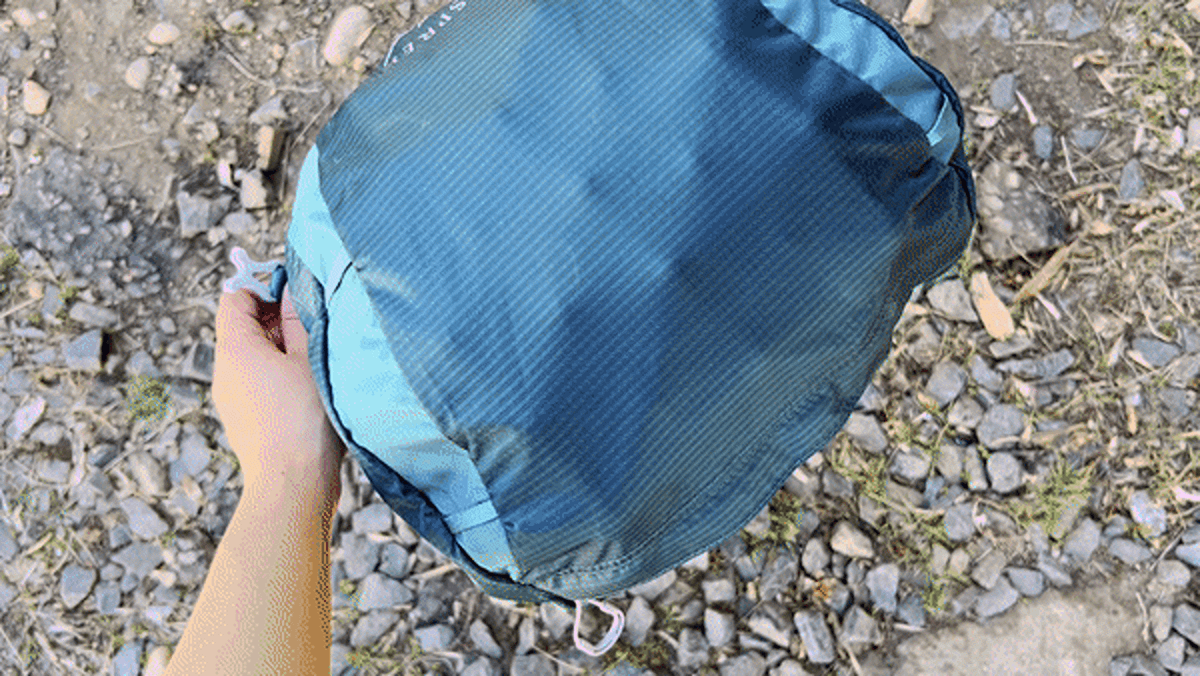 View of the loaded plastic balls on the mid-sized pack lid of Osprey Eja Backpack