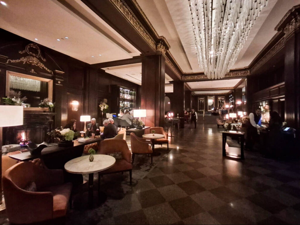 View of the dim lit opulent interior of the lobby of Rosewood Hotel Georgia