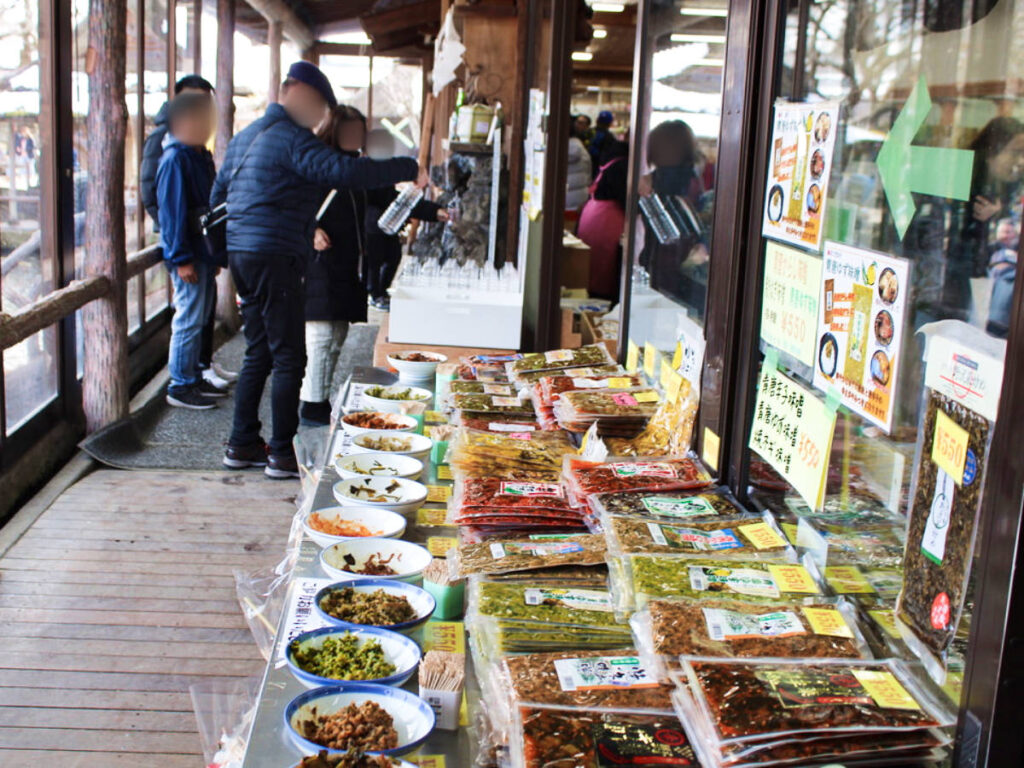 A table full of local goods for sale at the indoor market in Oshino Hakkai