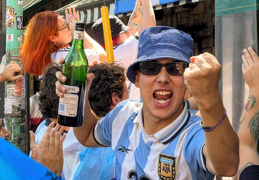A local holding a bottle of Fernet during the celebration of Argentina’s World Cup victory