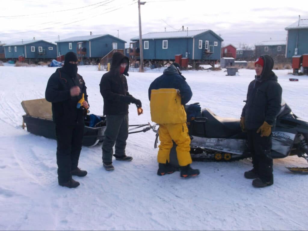 View of locals wearing layers in Alaska