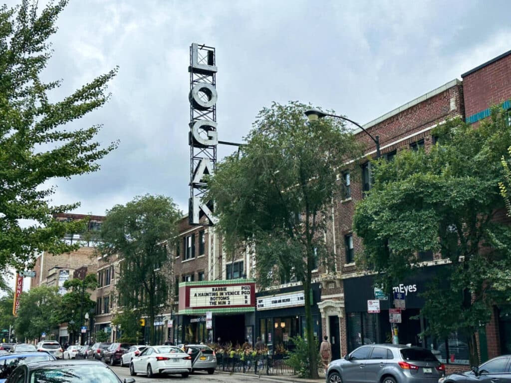 View of the buildings and the parked cars at the street of Logan Square neighborhood