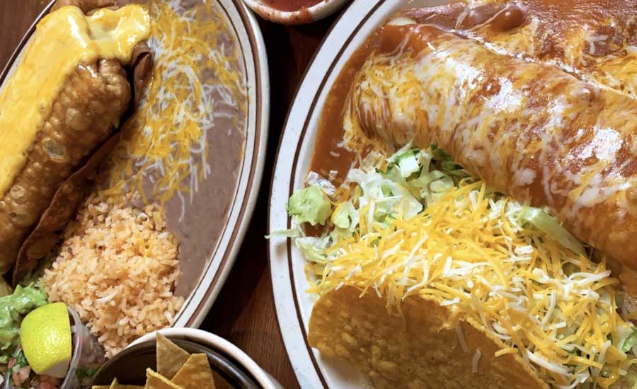 Tacos filled with cheese and nachos in Los Dos Molinos