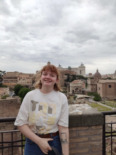 Louise Wylie smiling for a photo in Rome, Italy