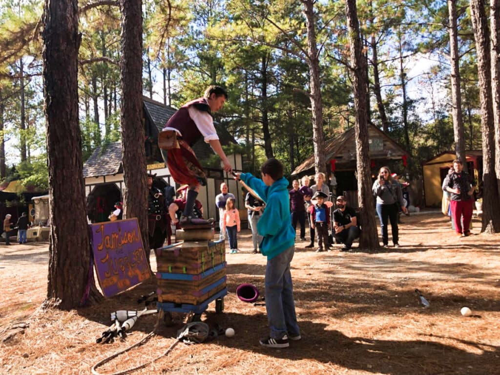 View of the people watching the performer at the Louisiana Renaissance Festival