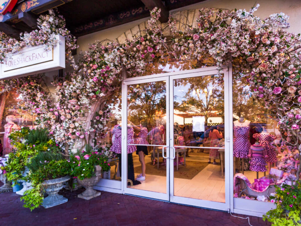 View of the floral decorations at the entrance of Love Shack Fancy Store at Highland Park