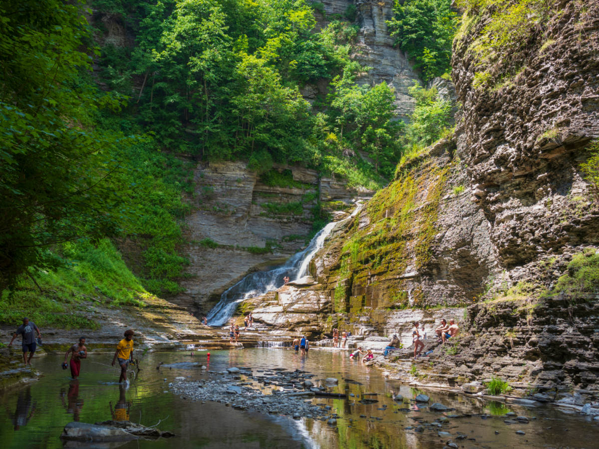Hikers cool themselves in Lucifer Falls