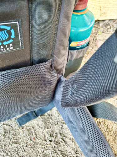 Closeup view of the lumbar pad, hip belt, and shoulder straps of the backpack