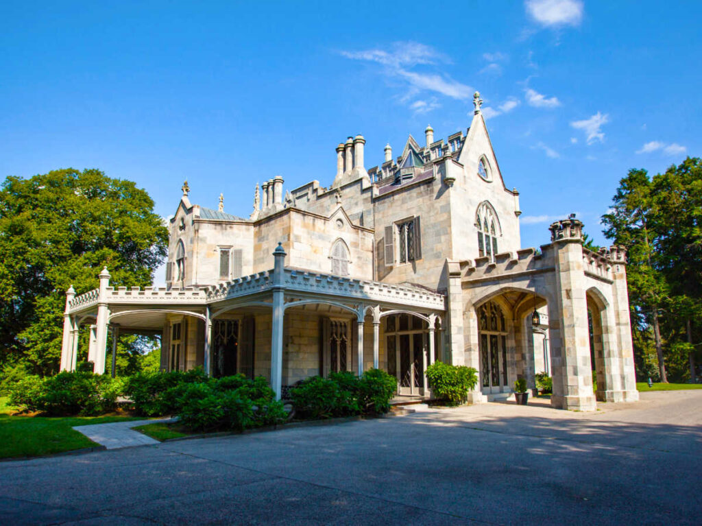 Exterior view of the Lyndhurst Mansion with a clear sky in the background