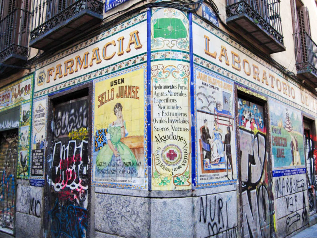 Colorful mural around a building in the street of Madrid