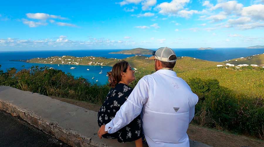 The author with her wife and the clear blue sky above Magens Bay
