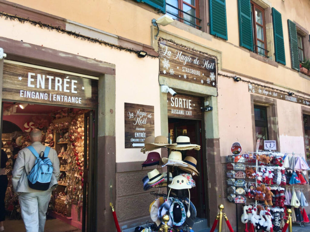 A man entering the “Magic of Christmas” boutique