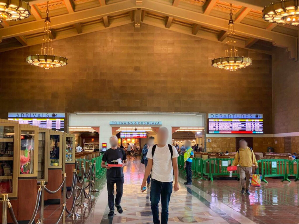 People walking and waiting for their trains at Main Terminal, Union Station