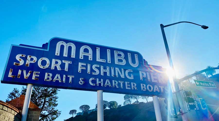 The Malibu Sport Fishing Pier signage on the entrance