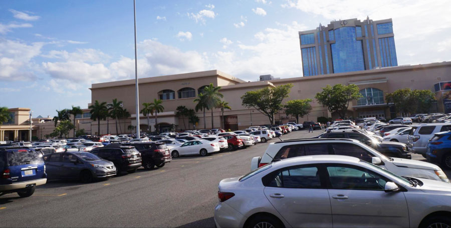 View of cars parked outside a mall in San Juan
