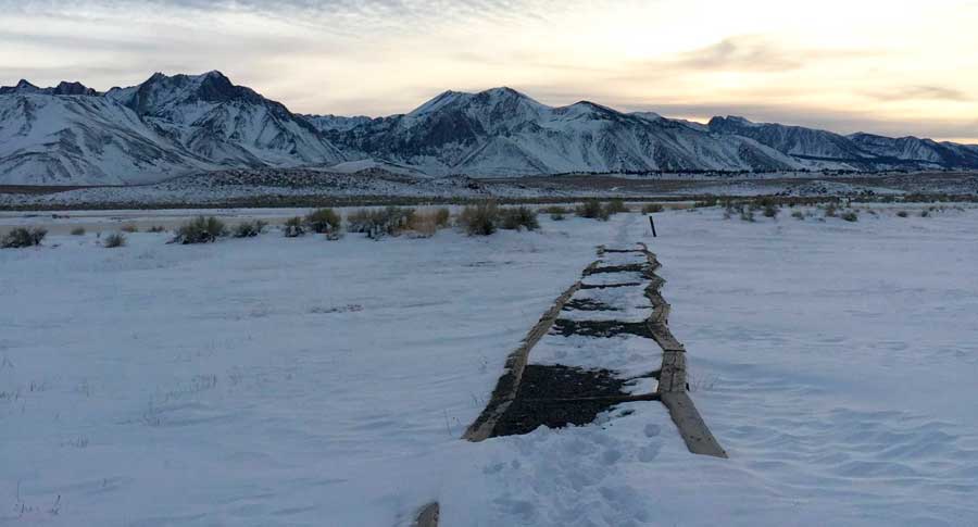 A trail covered with snow in Mammoth Lakes during winter