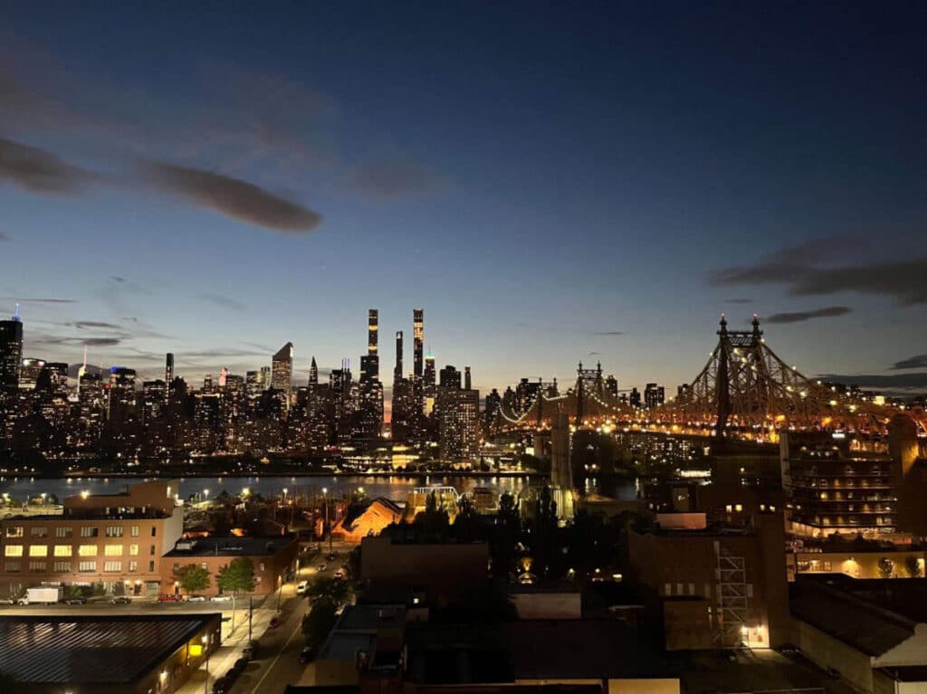 Overlooking view of buildings in Manhattan at night