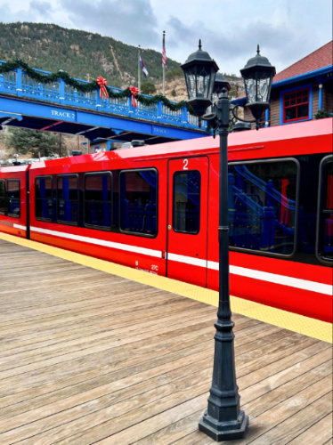 View of the red train at the railway station in Manitou Springs