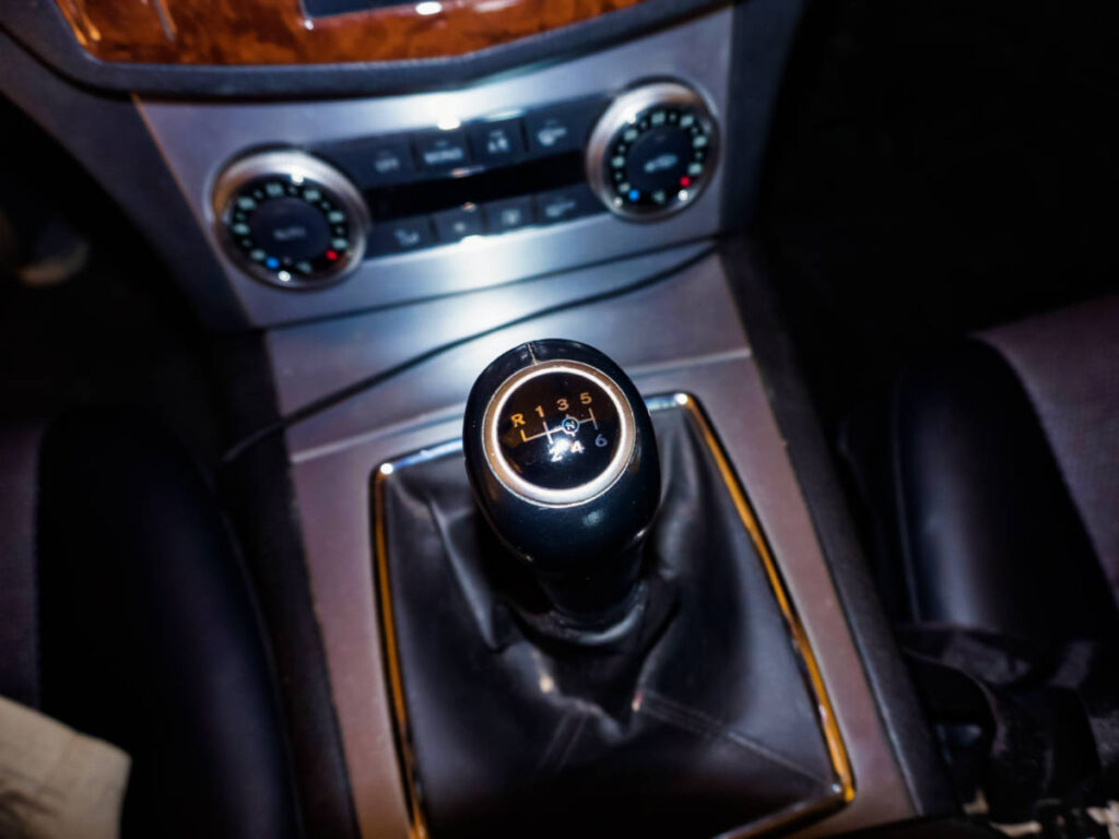Closeup look of the gear level of a manual transmission in Paris