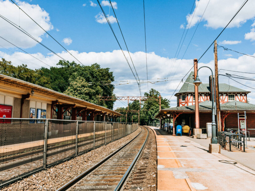 View of the train tracks and the empty platform at the Maplewood Train Station