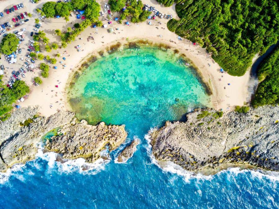 Aerial view of Mar Chiquita's little beach with turquoise blue water