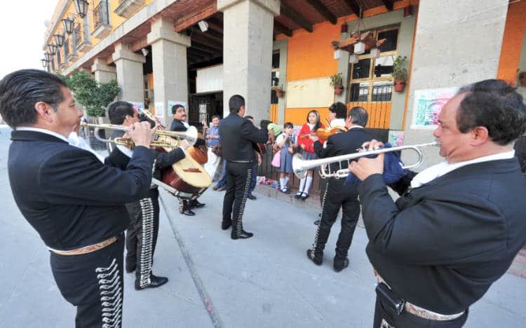 A Mariachi band play mexican music in Garibaldi Square