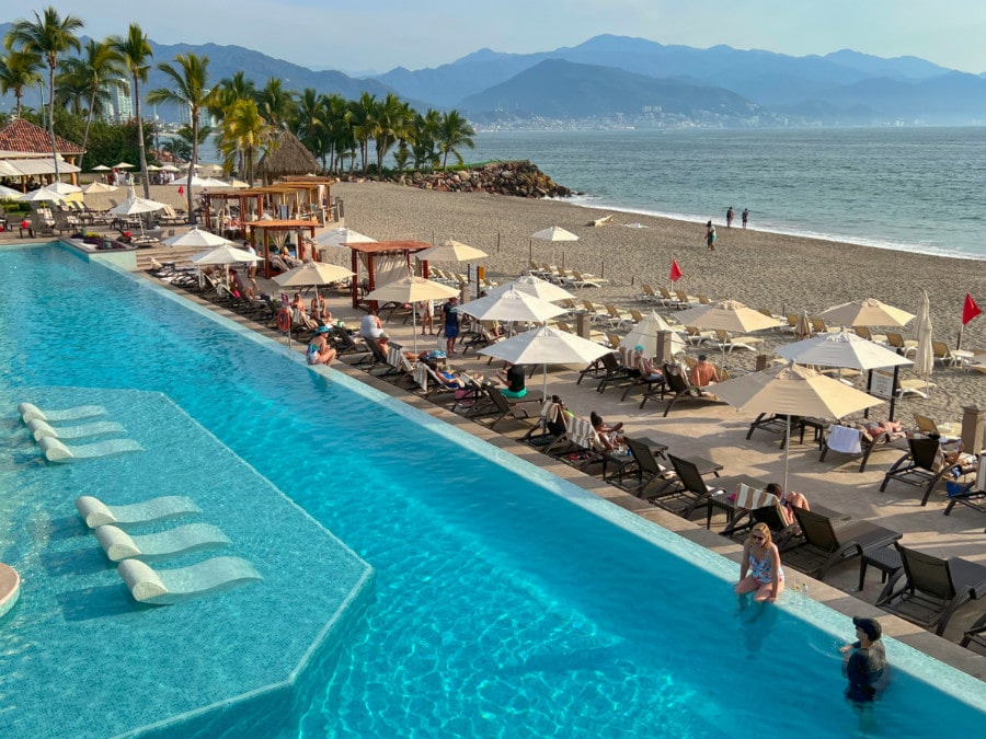 View of people in the pool-by-the-beach in Marriot Resort Puerto Vallarta