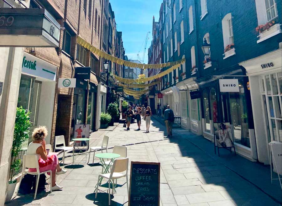 View of people wandering in Marylebone during a sunny day