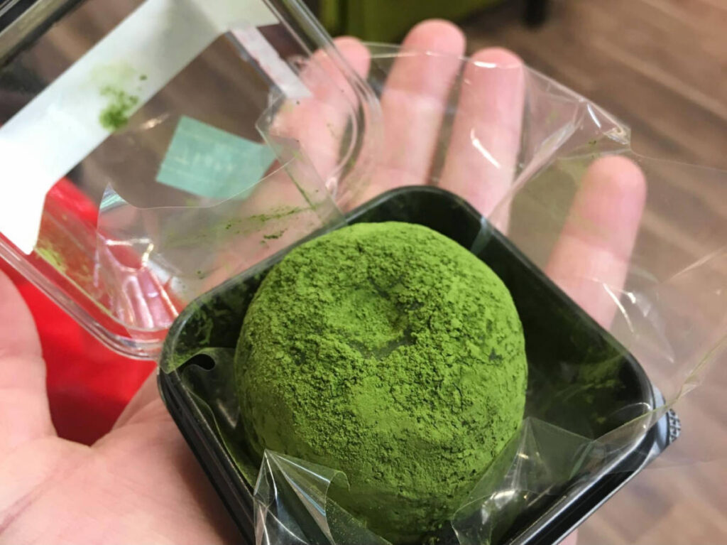 The author, holding a matcha mochi ball