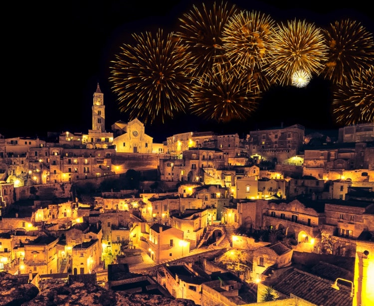 Matera Italy by Night with fireworks over Sasso Barisano