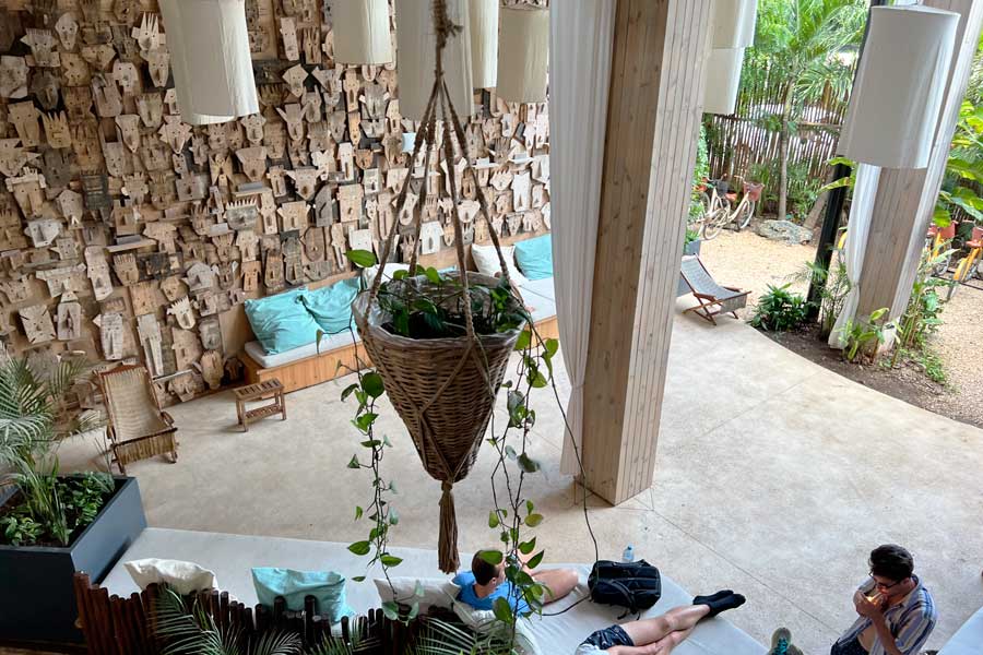 People relaxing at an area in Mayan Monkey