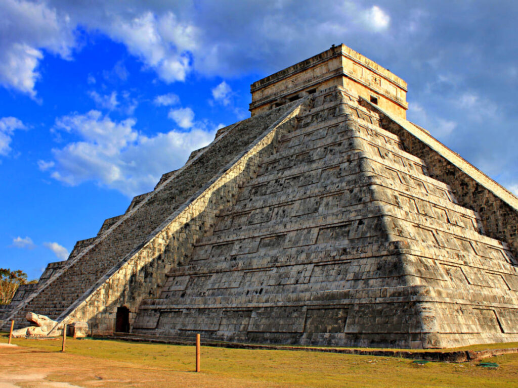 Mayan pyramid over blue sky at equinox day in Chichen Itza, Mexico