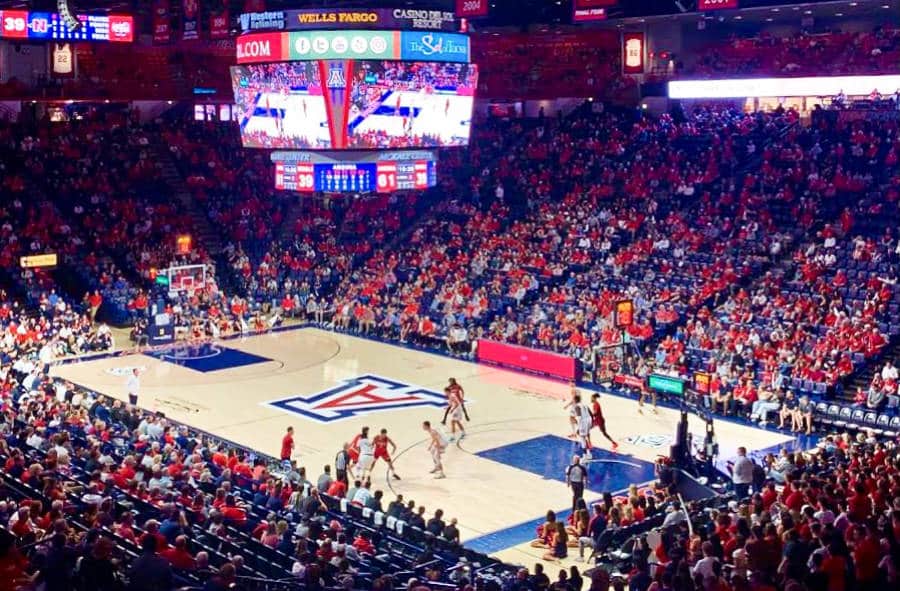 View inside the arena of people watching the basketball game of The Wildcats against Nicholls State