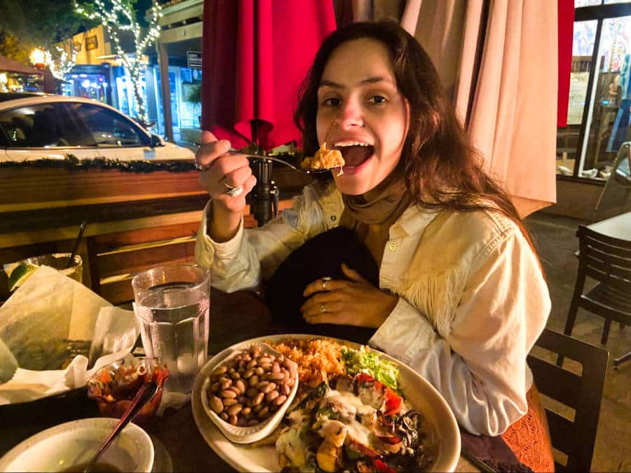 The author, McKenna, eating her hot plate of veggie fajitas at El Ranchito